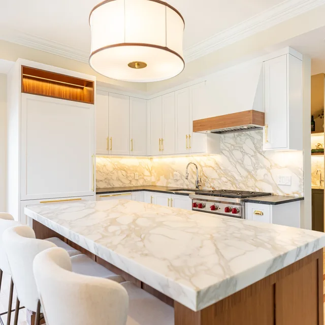 White shaker kitchen with marble island